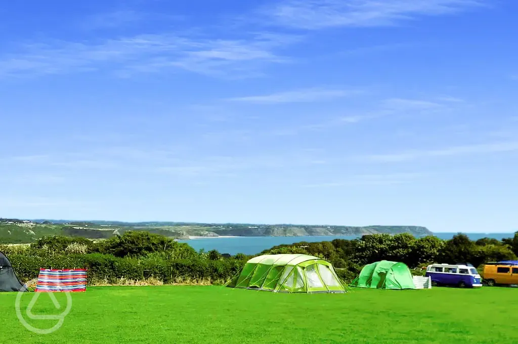 Non electric grass pitches overlooking Oxwich Bay