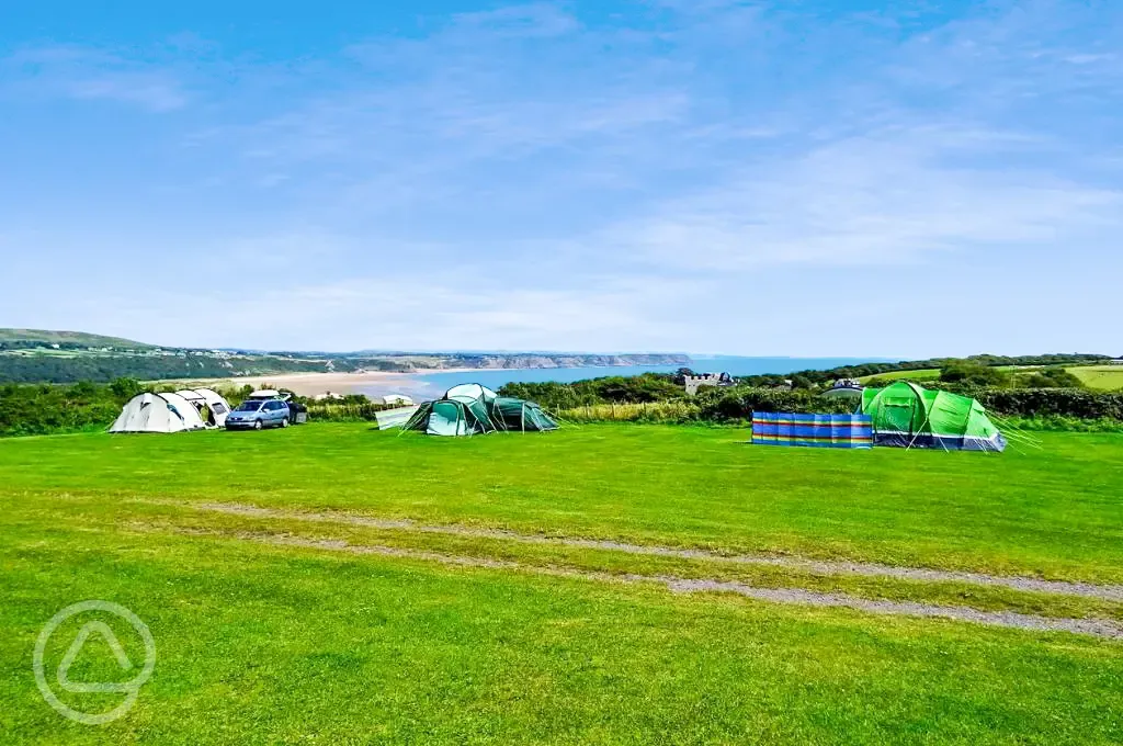 Non electric grass pitches overlooking Oxwich Bay