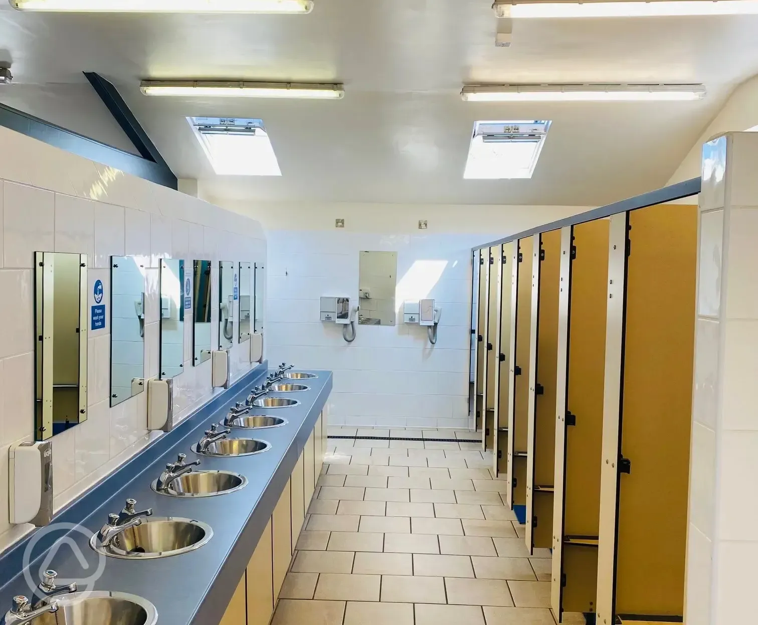 Heated toilet block at Greenways of Gower with coin-operated hairdryers