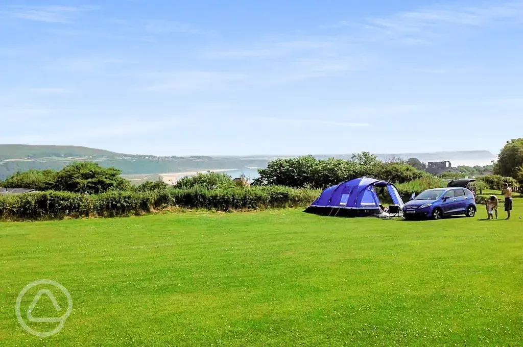 Non electric grass pitches with parking next to pitch