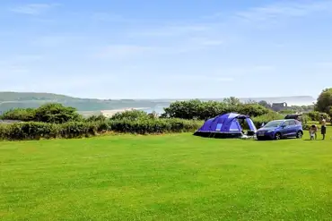 Non electric grass pitches with parking next to pitch