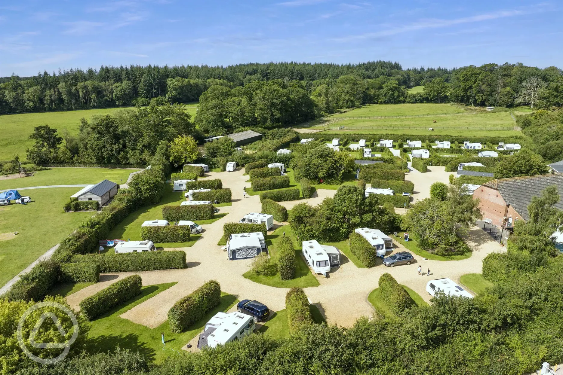 Aerial of the serviced hardstanding pitches with privacy hedging