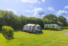 Fully serviced grass pitches with electric, water and grey waste outlet