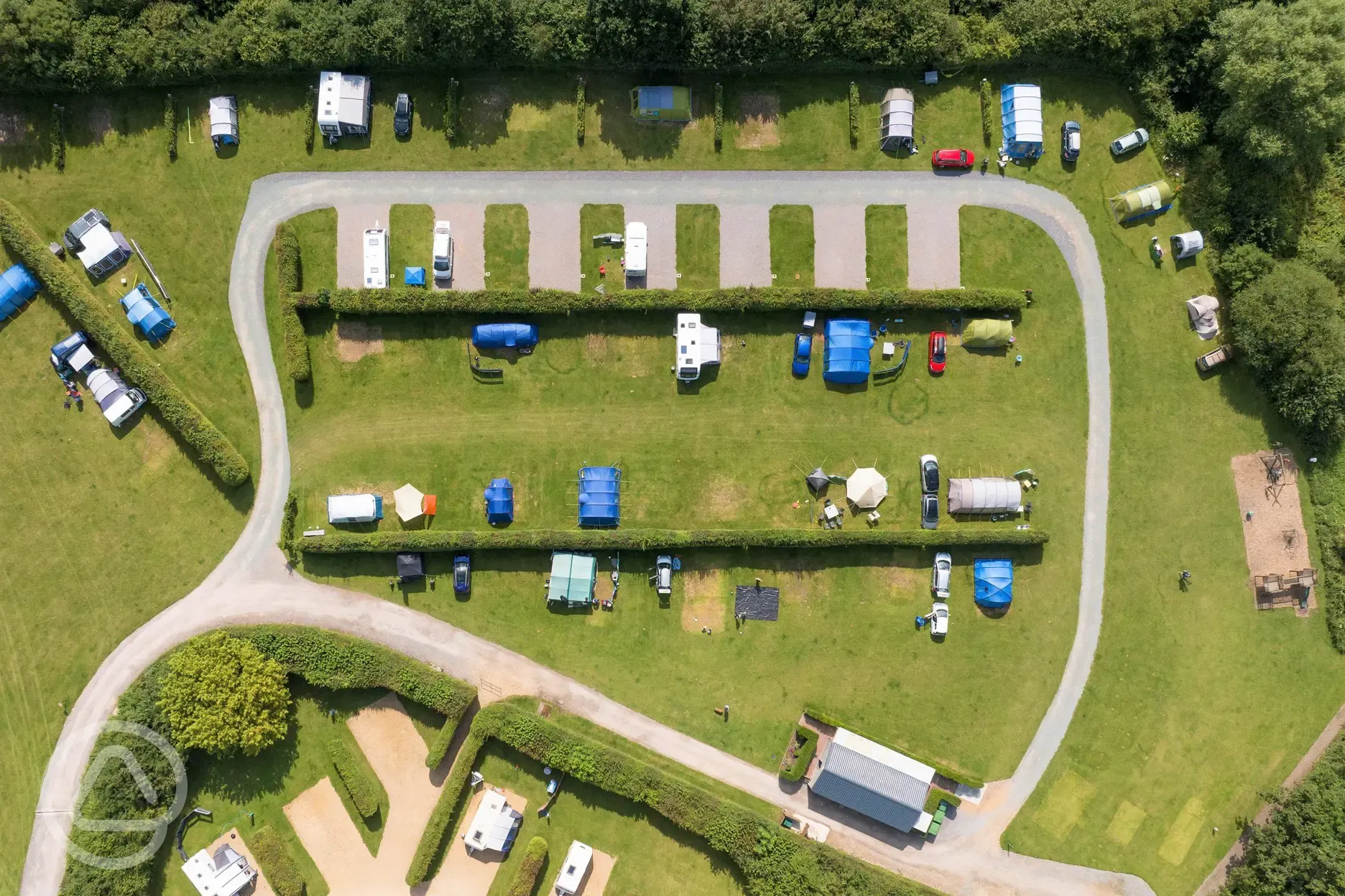 Bird's eye view of the campsite with hedging between areas