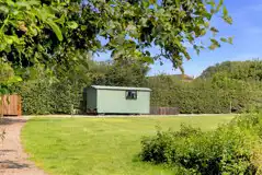 Shepherd's hut with a small gated garden