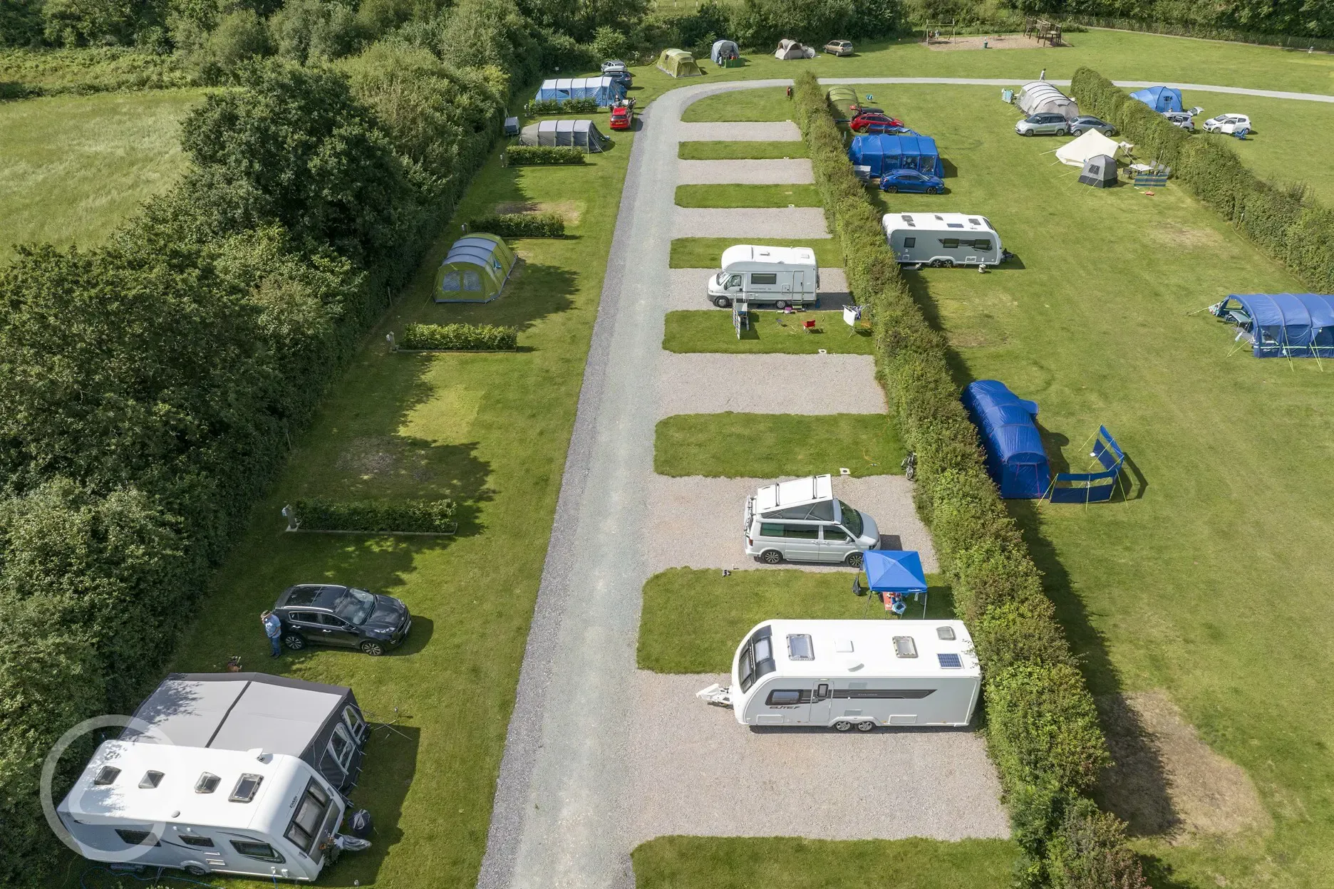 Electric grass and hardstanding pitches (set within the camping field area)