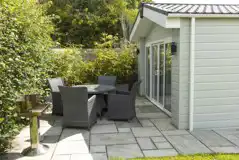 Minstead lodge with outdoor patio and seating area