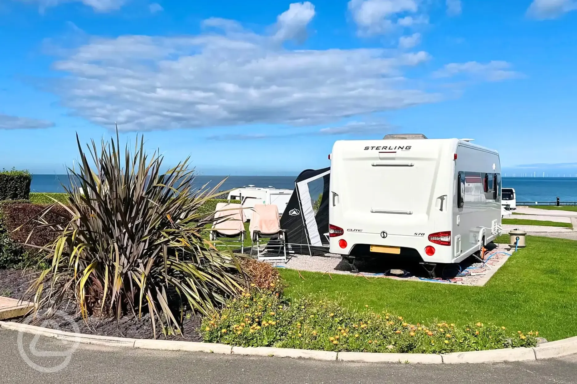 Serviced electric hardstanding pitches with 16 amp hook ups