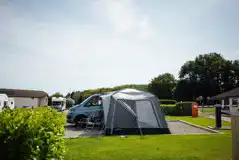 Serviced electric double hardstanding pitches with room for awnings Serviced electric double hardstanding pitches with room for awnings