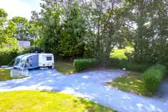 Electric hardstanding and small grass pitches with 16 amp hook up and water