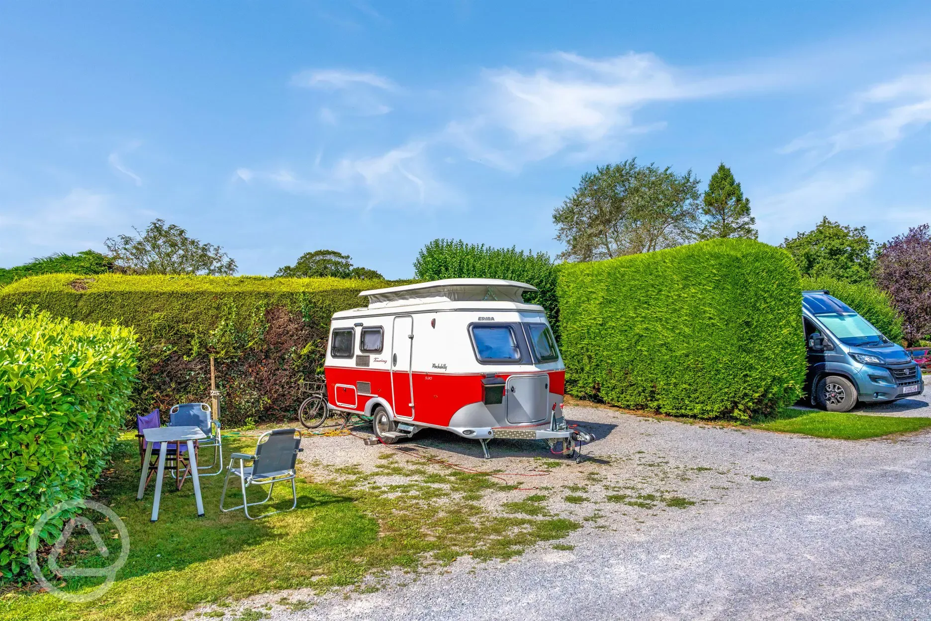 Electric hardstanding and small grass pitch