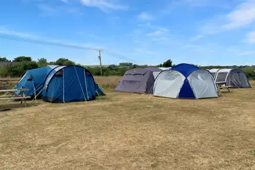 Non electric grass tent pitches