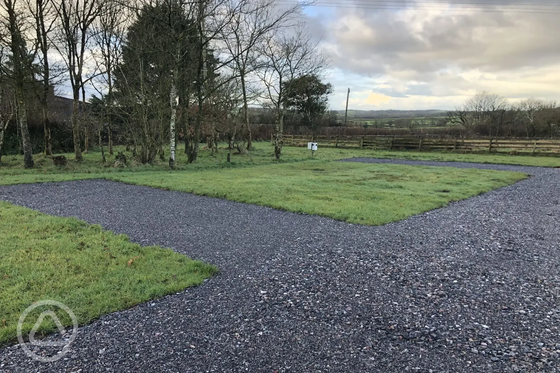 Electric hardstanding and grass pitches