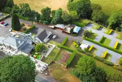 Aerial of Dartmoor Halfway Inn Campsite with hedges between pitches
