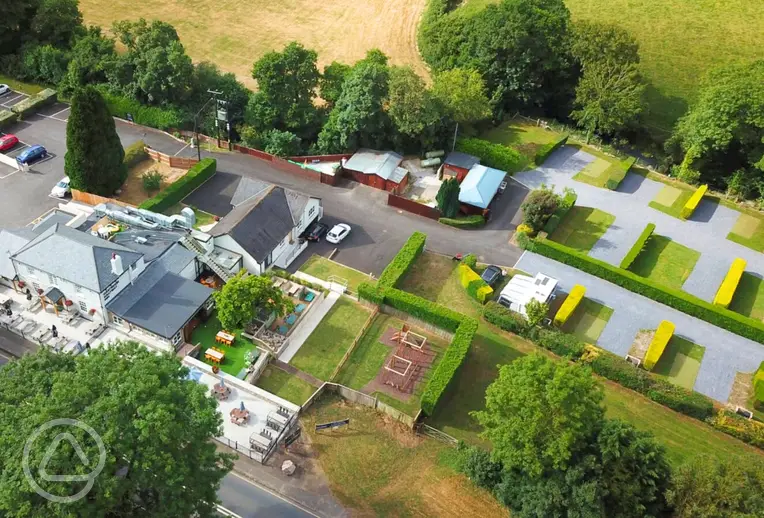 Aerial of Dartmoor Halfway Inn Campsite with hedges between pitches