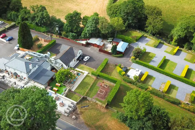 Aerial of Dartmoor Halfway Inn Campsite with hedges between pitches