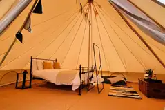 Bell tent with a double bed and furnishings (bed linen included)