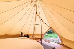 View from the double bed in a bell tent