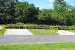 Premium plus hardstanding pitches with electric, TV, water and private hedging Premium plus hardstanding pitches with electric, TV, water and private hedging