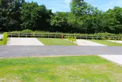 Premium plus hardstanding pitches with electric, TV, water and private hedging