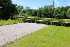 Premium plus hardstanding pitches with a grass area, measuring 11m by 10m