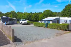 Premium hardstanding pitches with electric, water, waste disposal and TV aerial Premium hardstanding pitches with electric, water, waste disposal and TV aerial