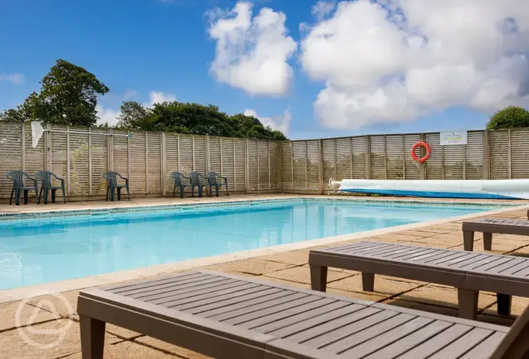 Outdoor heated swimming pool at Meadow Lakes Holiday Park, open May to September