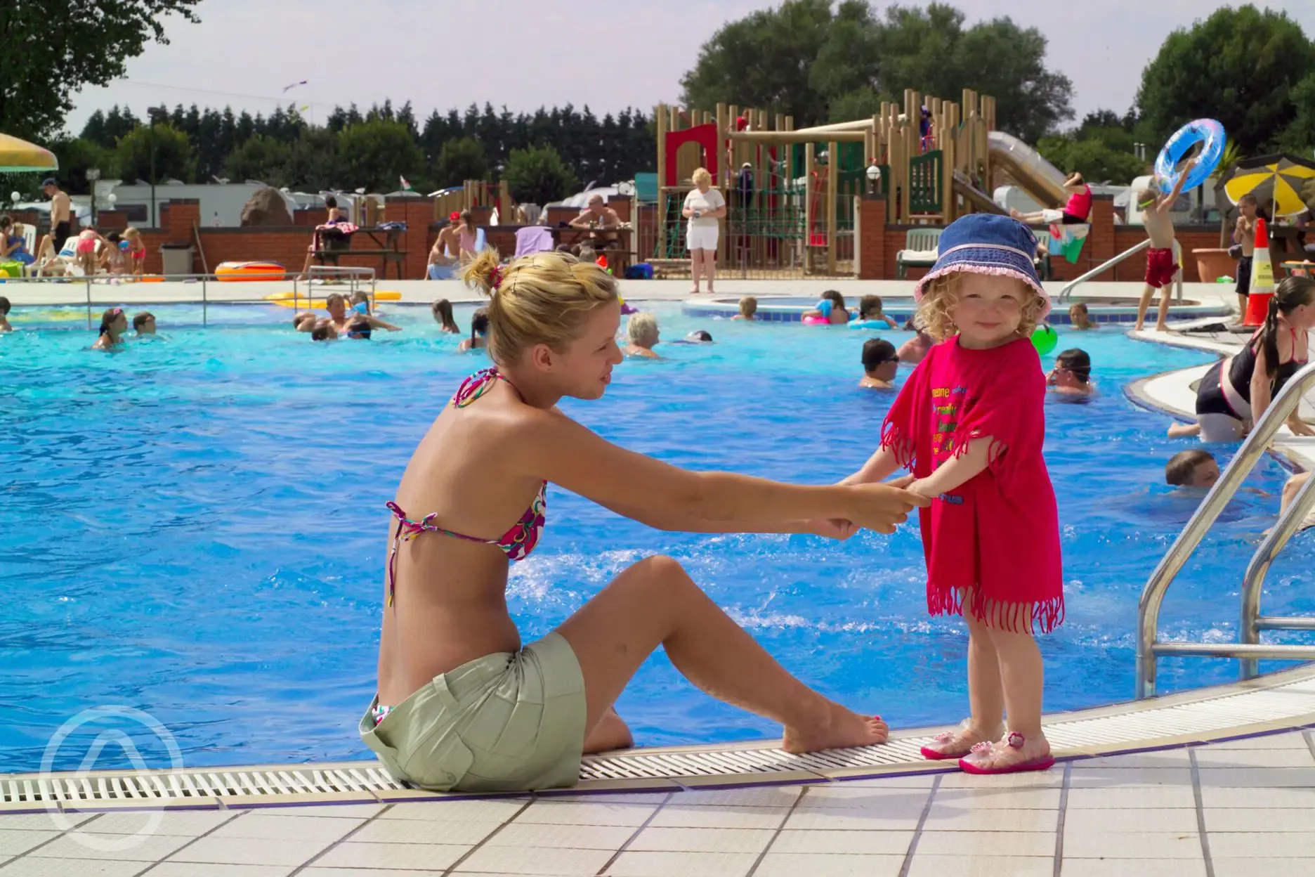 Outdoor heated swimming pool at Home Farm Holiday Park