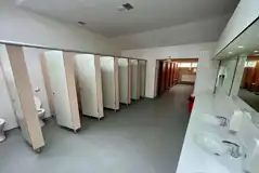 Female toilets with a communal hair dryer