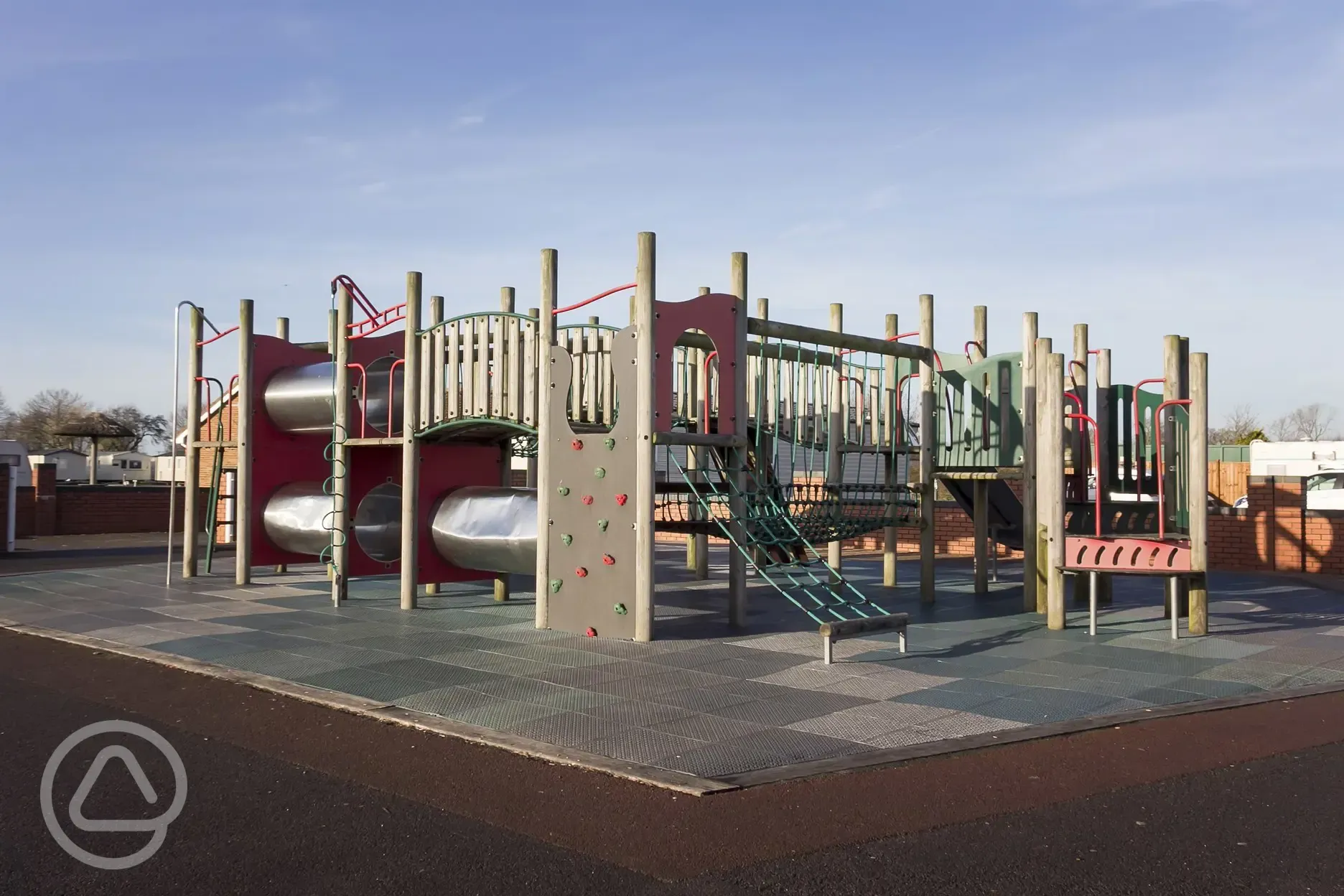 Children's play area with slides and climbing frames