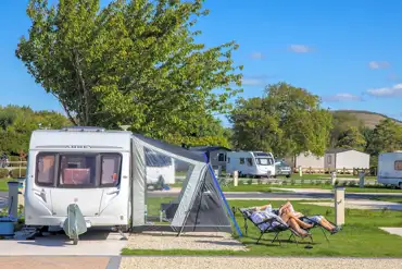 Caravan on electric hardstanding pitches with awning space 