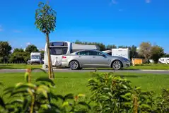 Electric hardstanding pitches with parking space available