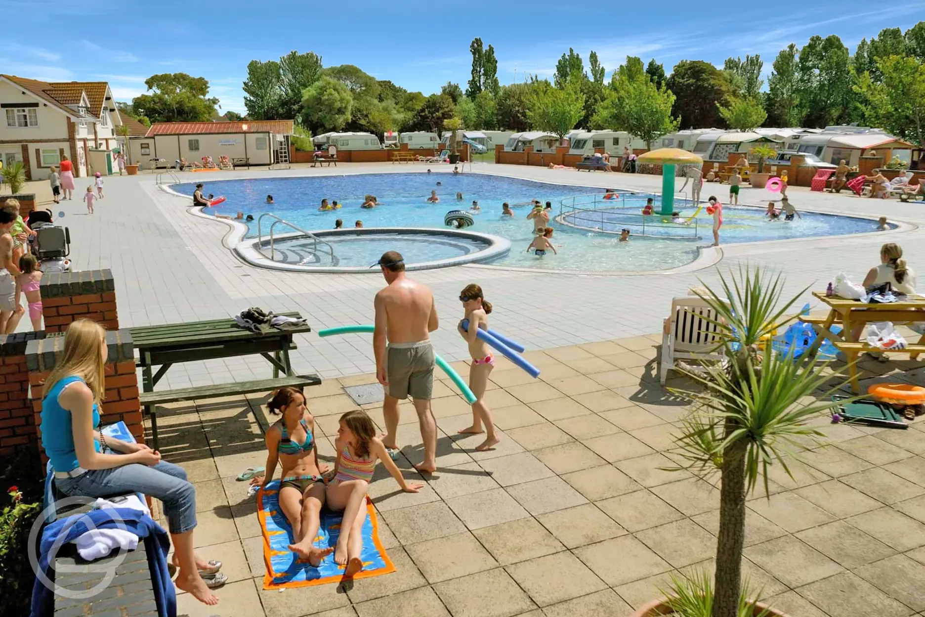 Outdoor heated swimming pool at Home Farm Holiday Park
