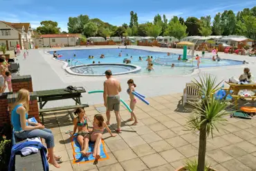 Outdoor heated swimming pool at Home Farm Holiday Park