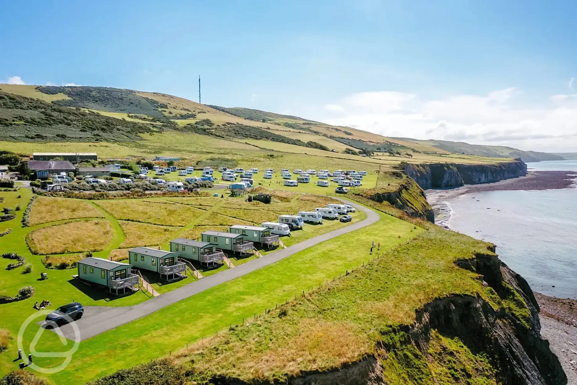 Aerial of grass pitches overlooking the cliff at Morfa Bychan 
