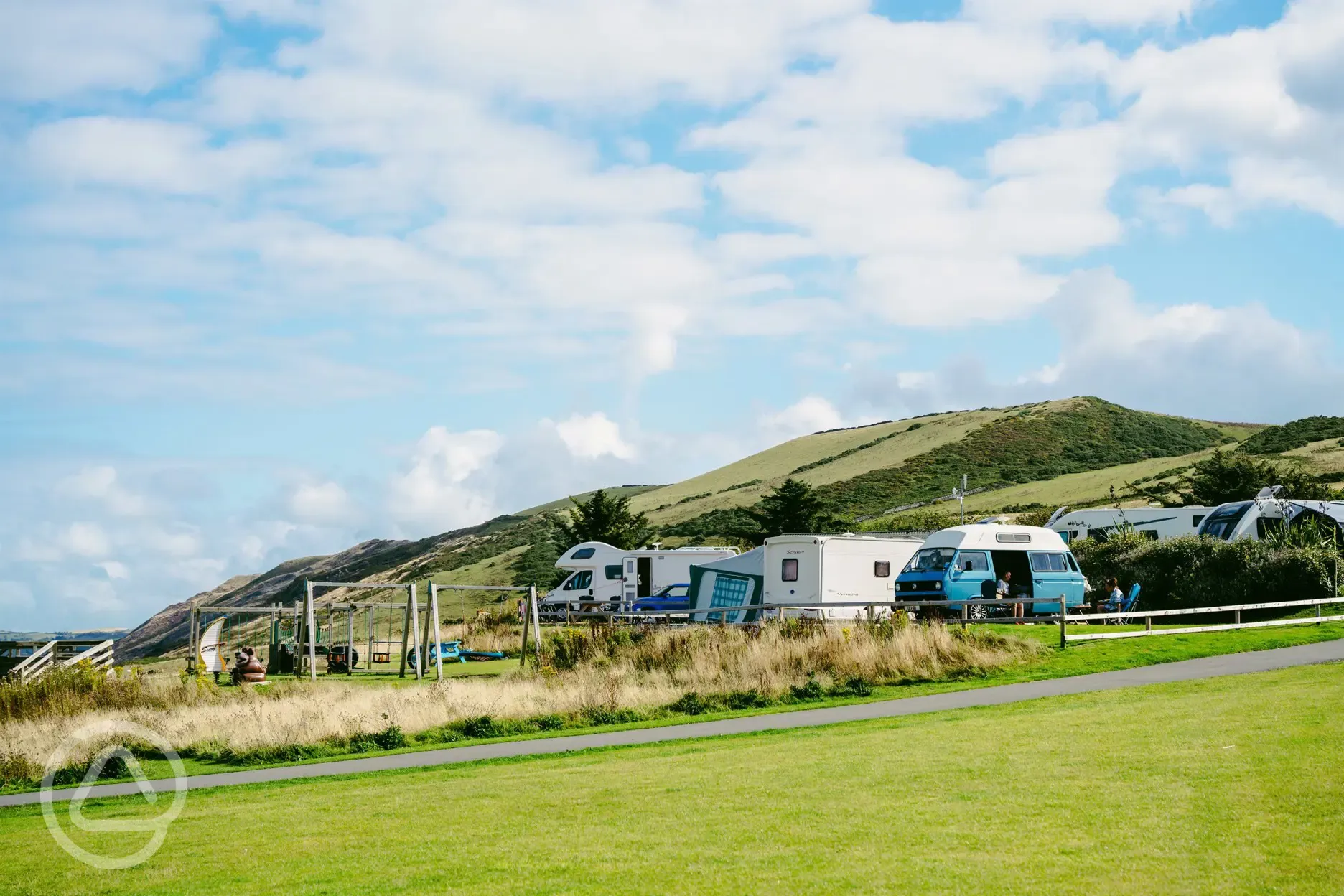 Peregrine pitches for campervans and motorhomes next to playground