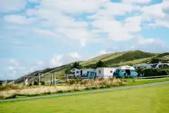 Peregrine pitches for campervans and motorhomes next to playground