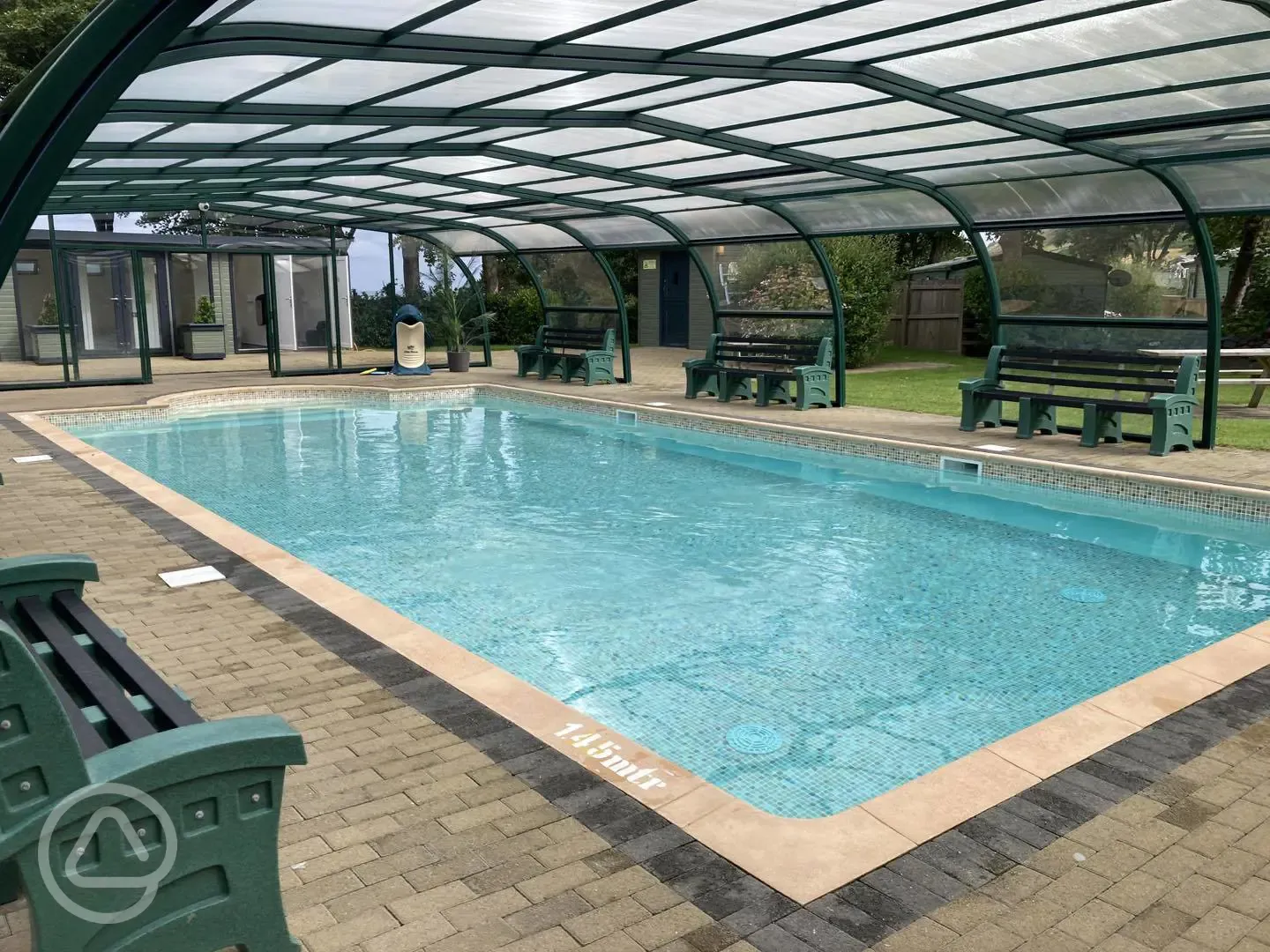 Swimming pool with seating surrounding the pool