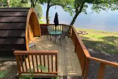 Camping pod with decking and seating