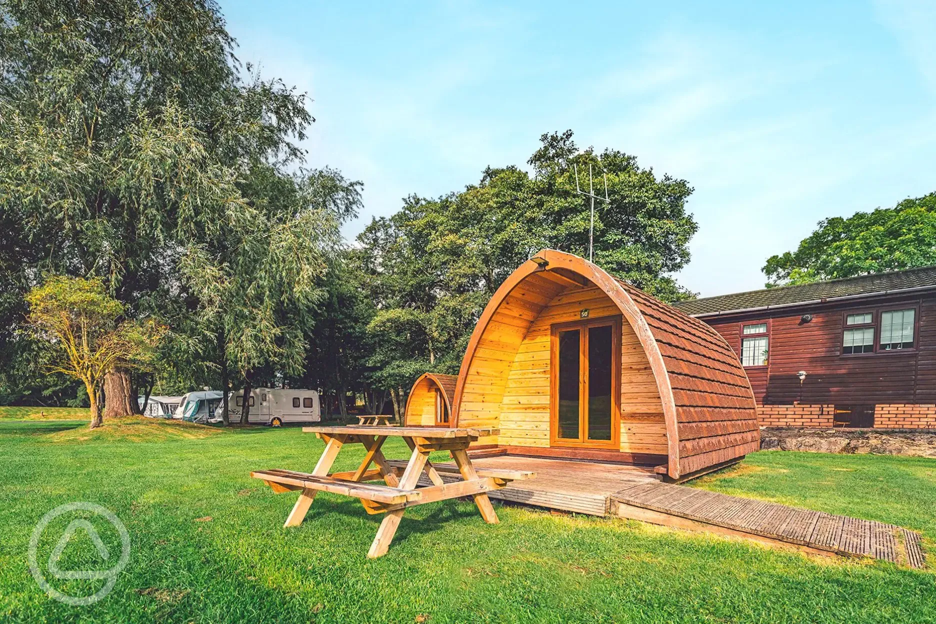 Camping pod with a decked outdoor area