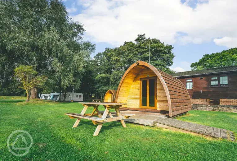 Camping pod with a decked outdoor area