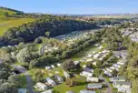 Aerial of Riverside Wooler Holiday Park with hardstanding pitches