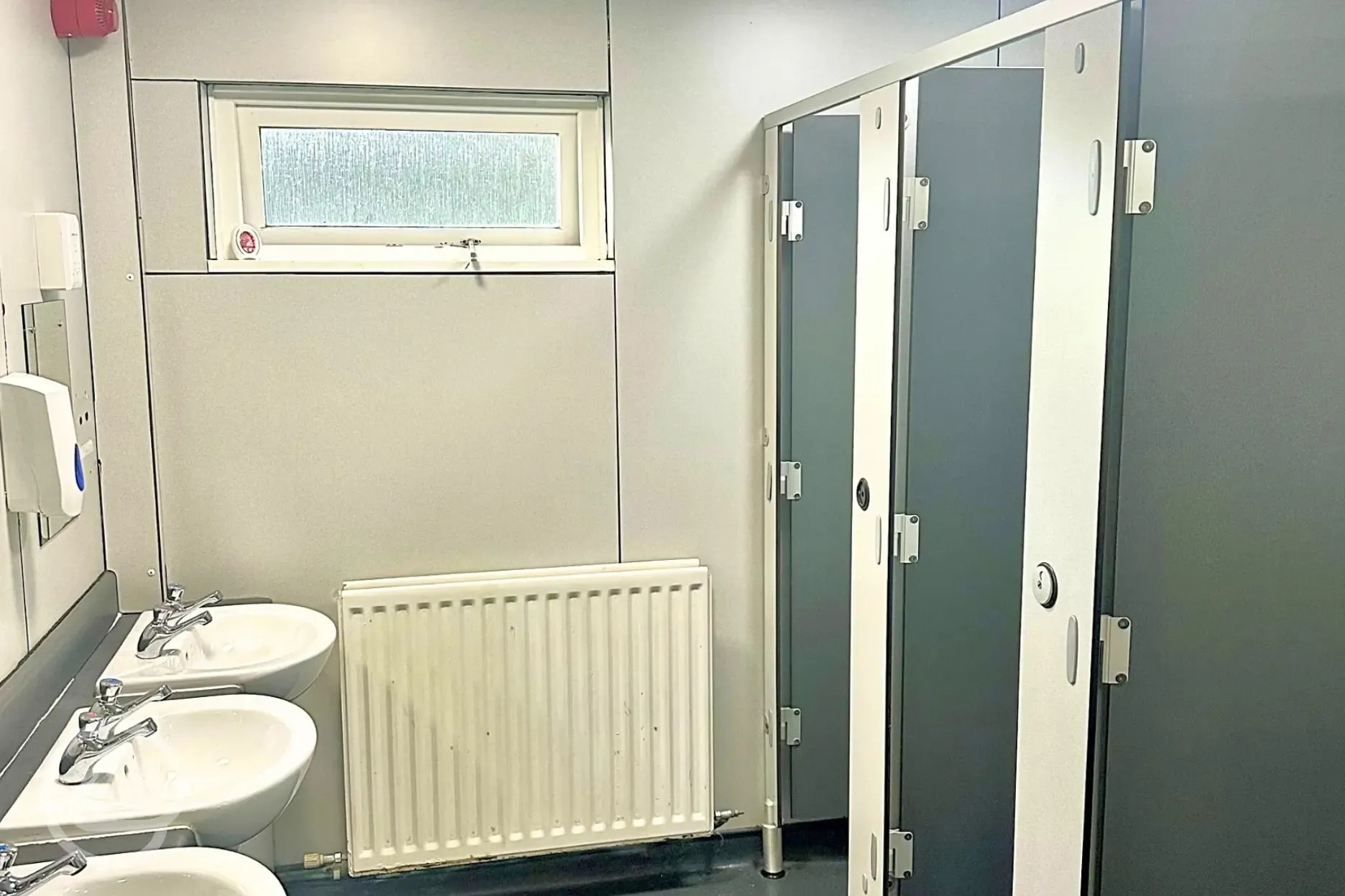 Toilets with radiators and hand basins