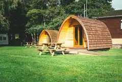 Camping pods with picnic benches
