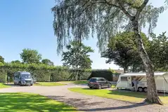 Fully serviced hardstanding pitches (6.1m x 7.6m) Fully serviced hardstanding pitches (6.1m x 7.6m)