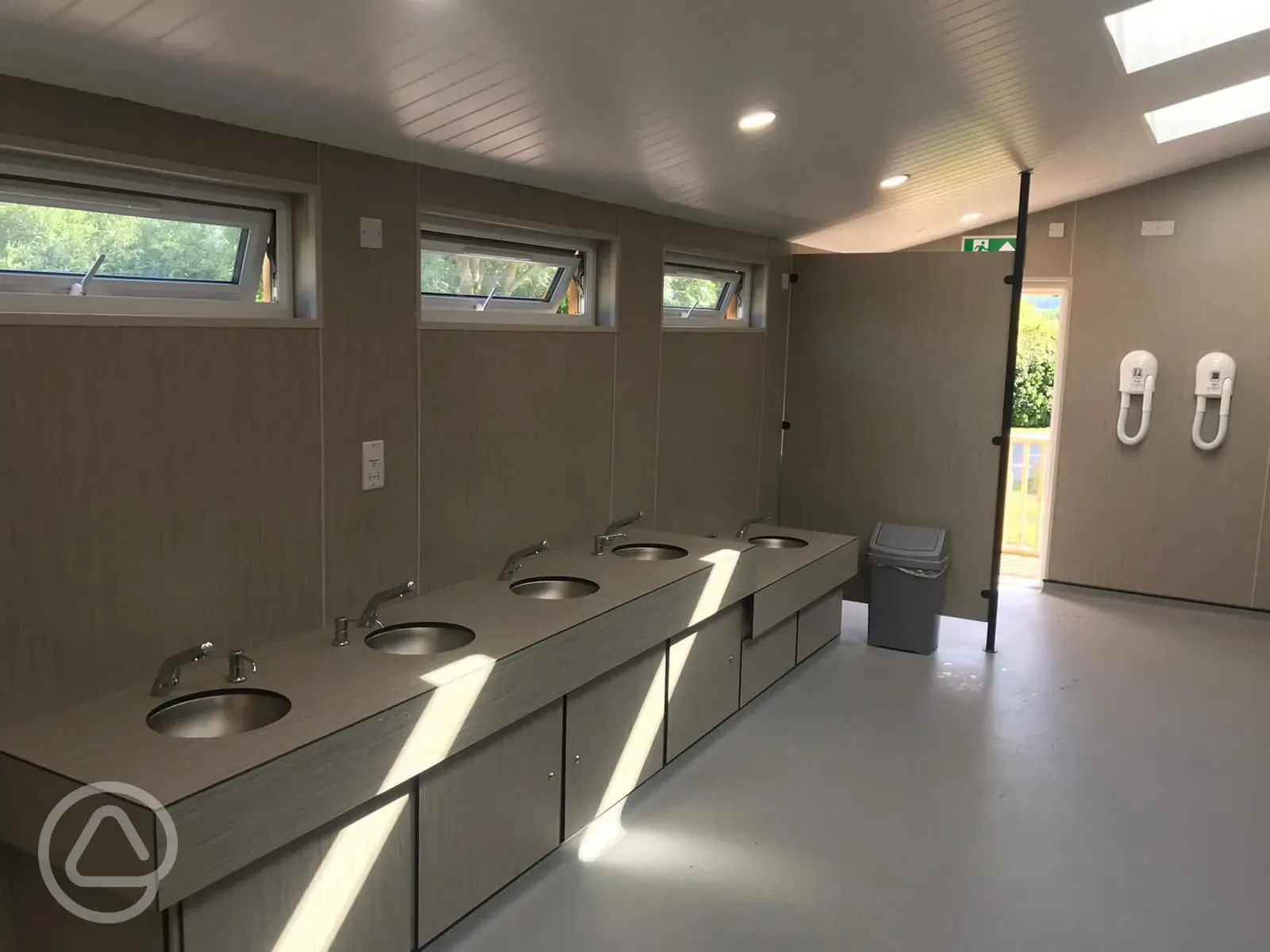 Hair dryers and wash basins in the facilities block at Hurley Riverside Park