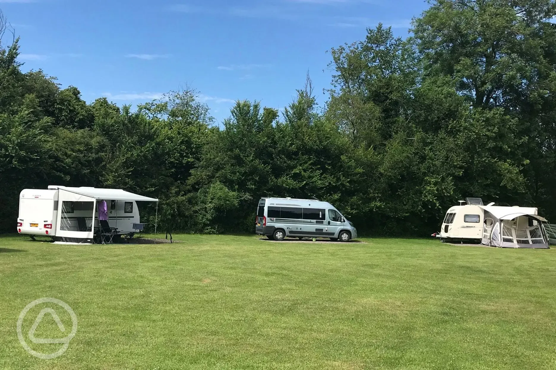 Premium hardstanding pitches at Hurley Riverside Park with awning space