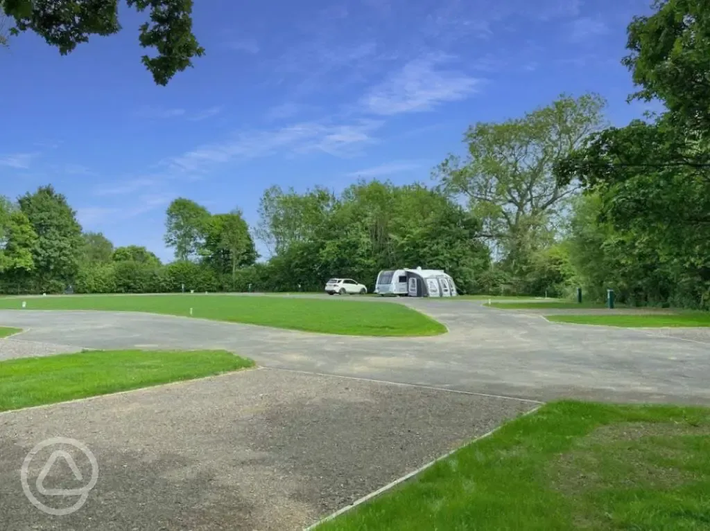 Hardstanding pitches at Hurley Riverside Park with awning and parking spaces