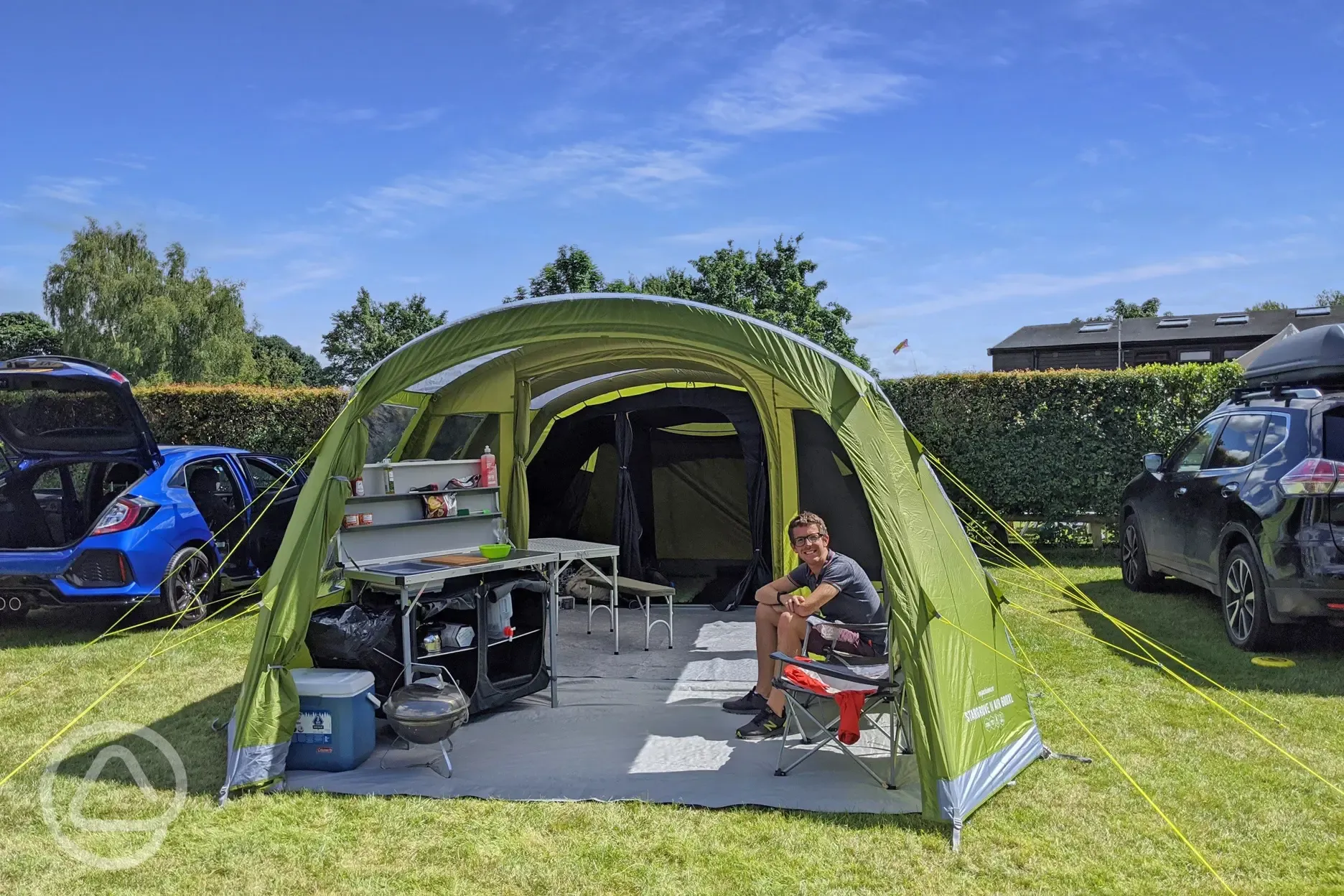 Tent on electric grass pitches with car parking space at Hurley Riverside Park