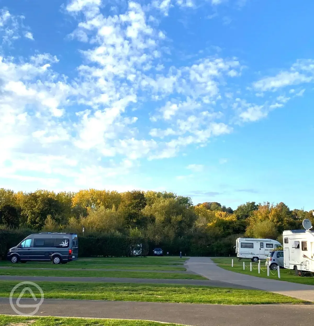 Hardstanding pitches at Hurley Riverside Park with a visiting hot air balloon Hardstanding pitches at Hurley Riverside Park with a visiting hot air balloon